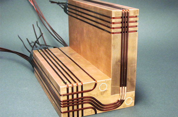 Mesoscopic atom chip on a block of copper